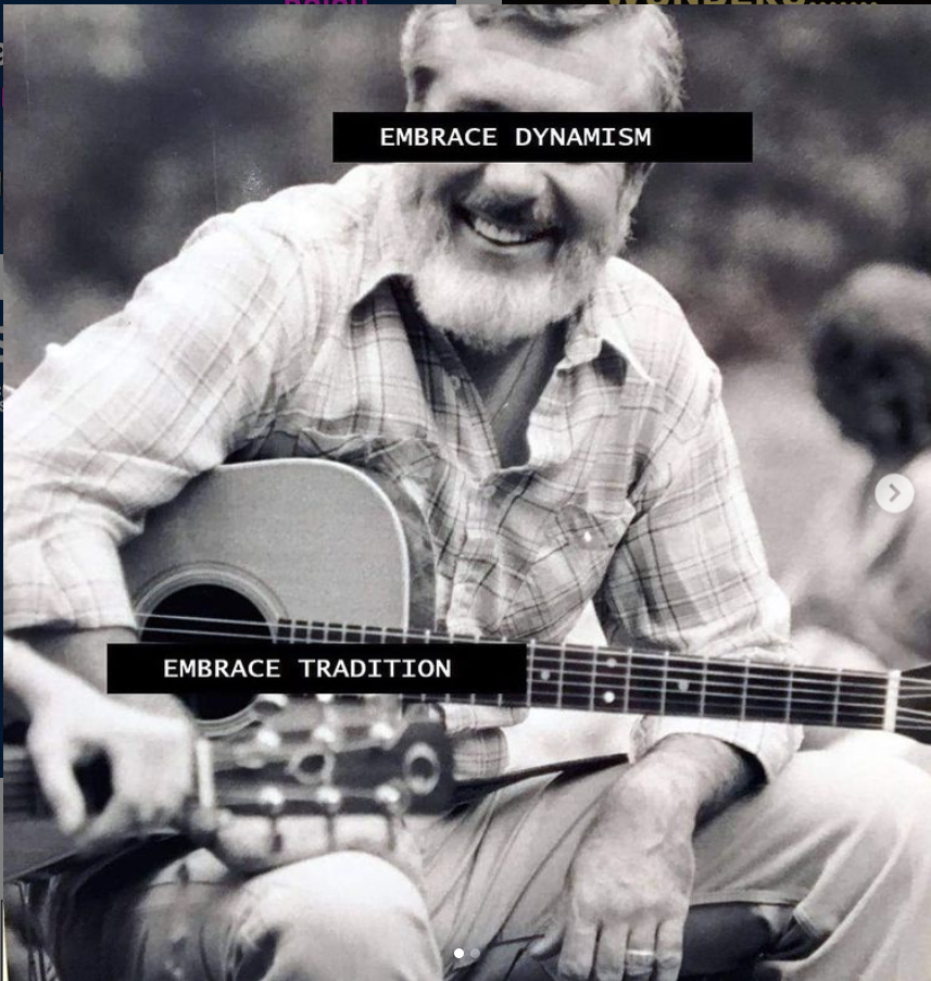 black and white photo of Barre Toelken (full body; seated and holding an acoustic guitar) with the phrase “embrace dynamism” over his face, and the phrase “embrace tradition” over the guitar.